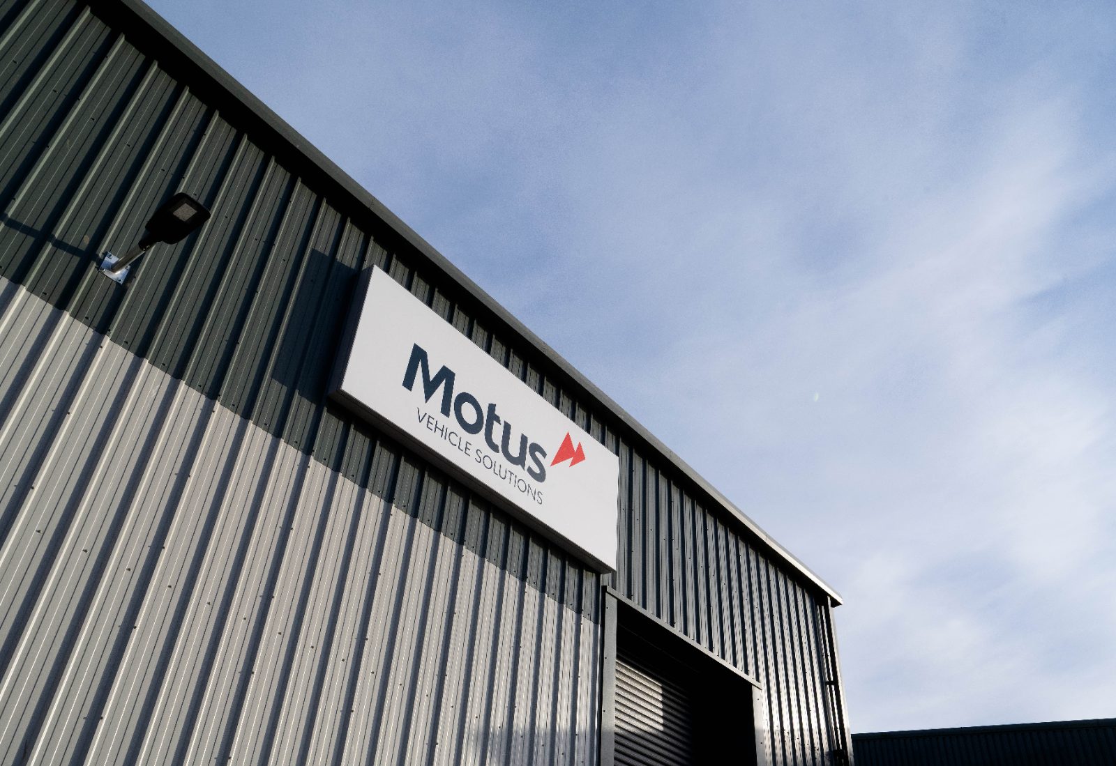 Motus Vehicle Solutions signage on the exterior of a group facility